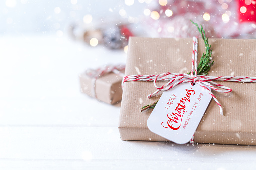 A gift box with a christmas tag for the holiday season