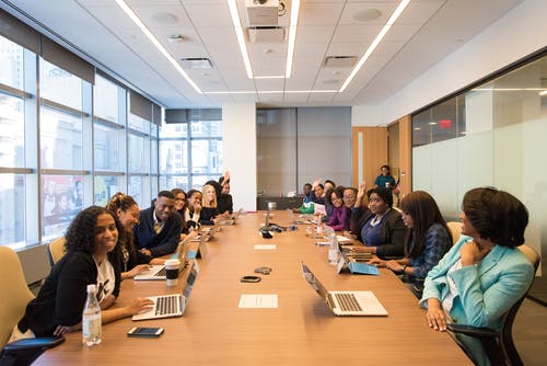 Image of both gender at a meeting